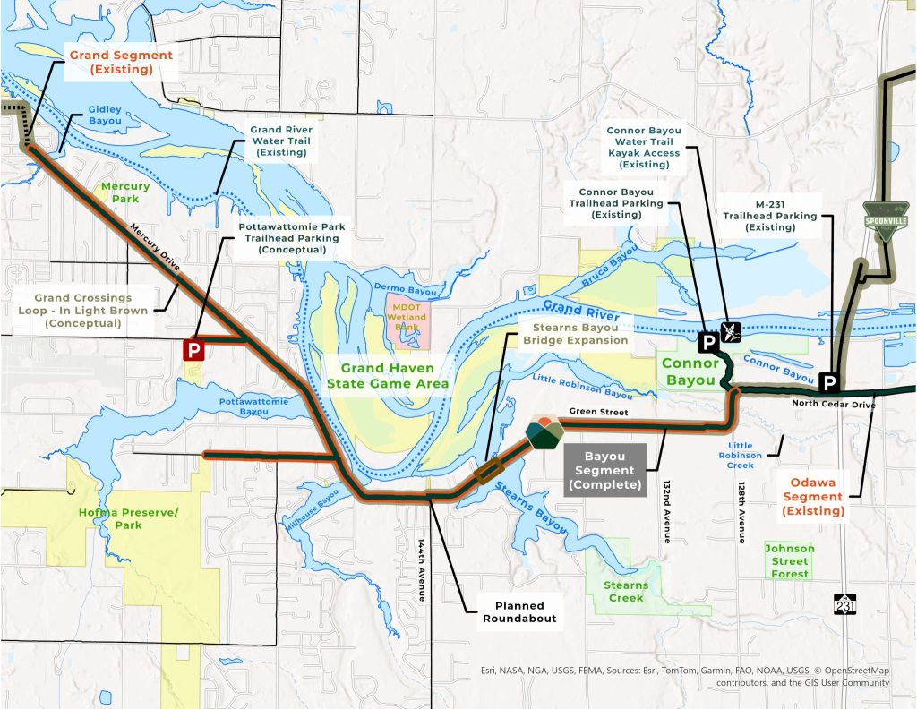 Map showing Grand River, bayous, trails, parks, and existing segments around Grand Haven State Game Area.