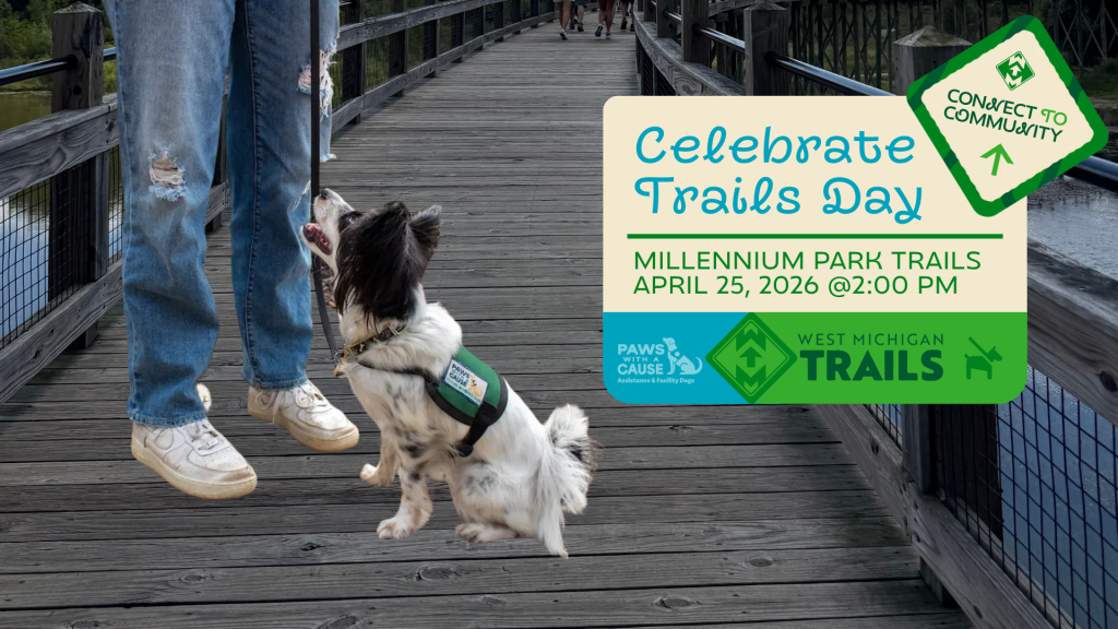 Dog on boardwalk with owner promotes Celebrate Trails Day event at Millennium Park Trails, April 25, 2026.